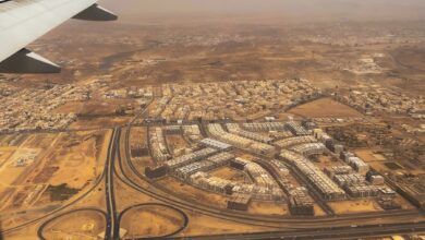Aerial view of Jeddah, Saudi Arabia showcasing urban planning and desert surroundings.