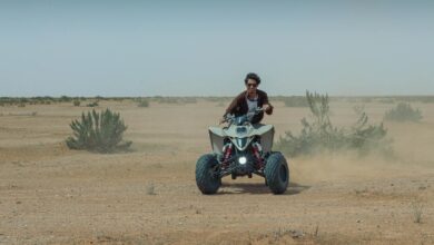 An adventurous ATV rider navigating the rugged desert landscape in Riyadh, Saudi Arabia.